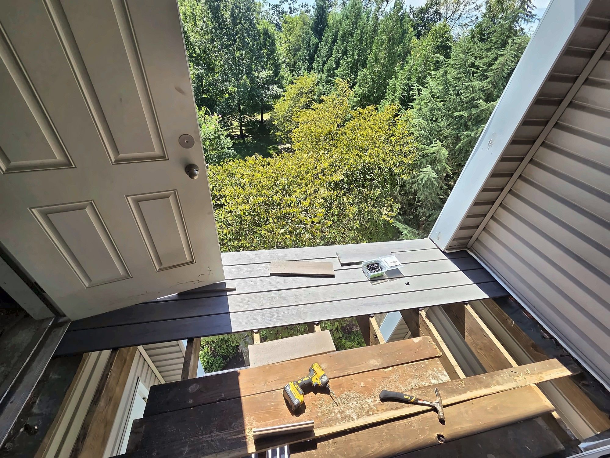 Balcony deck boards being replaced