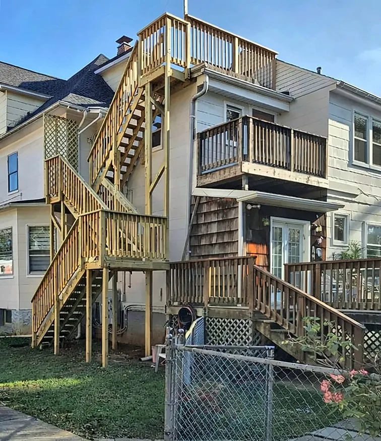 After: Before and after of rebuilt multi-story exterior stairs