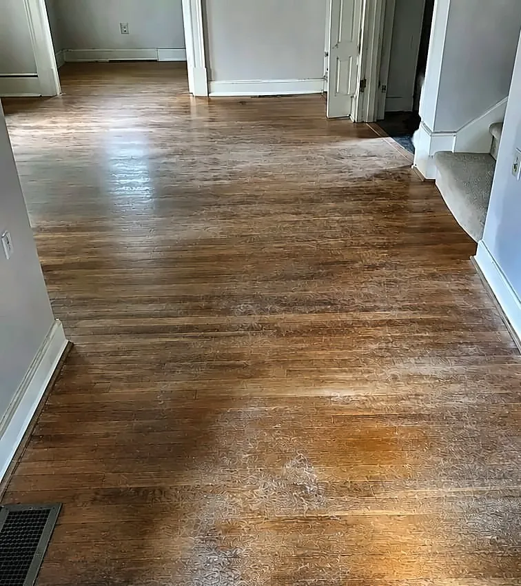 Before: Hardwood floor before and after refinishing