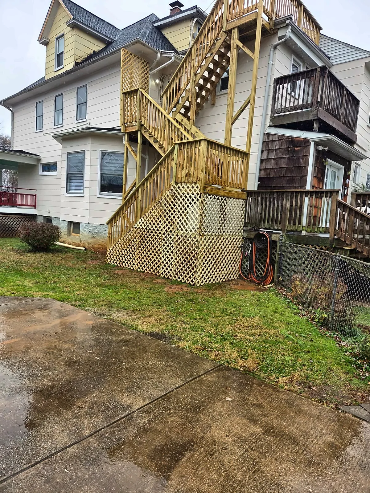 Finished multi-story exterior wood staircase