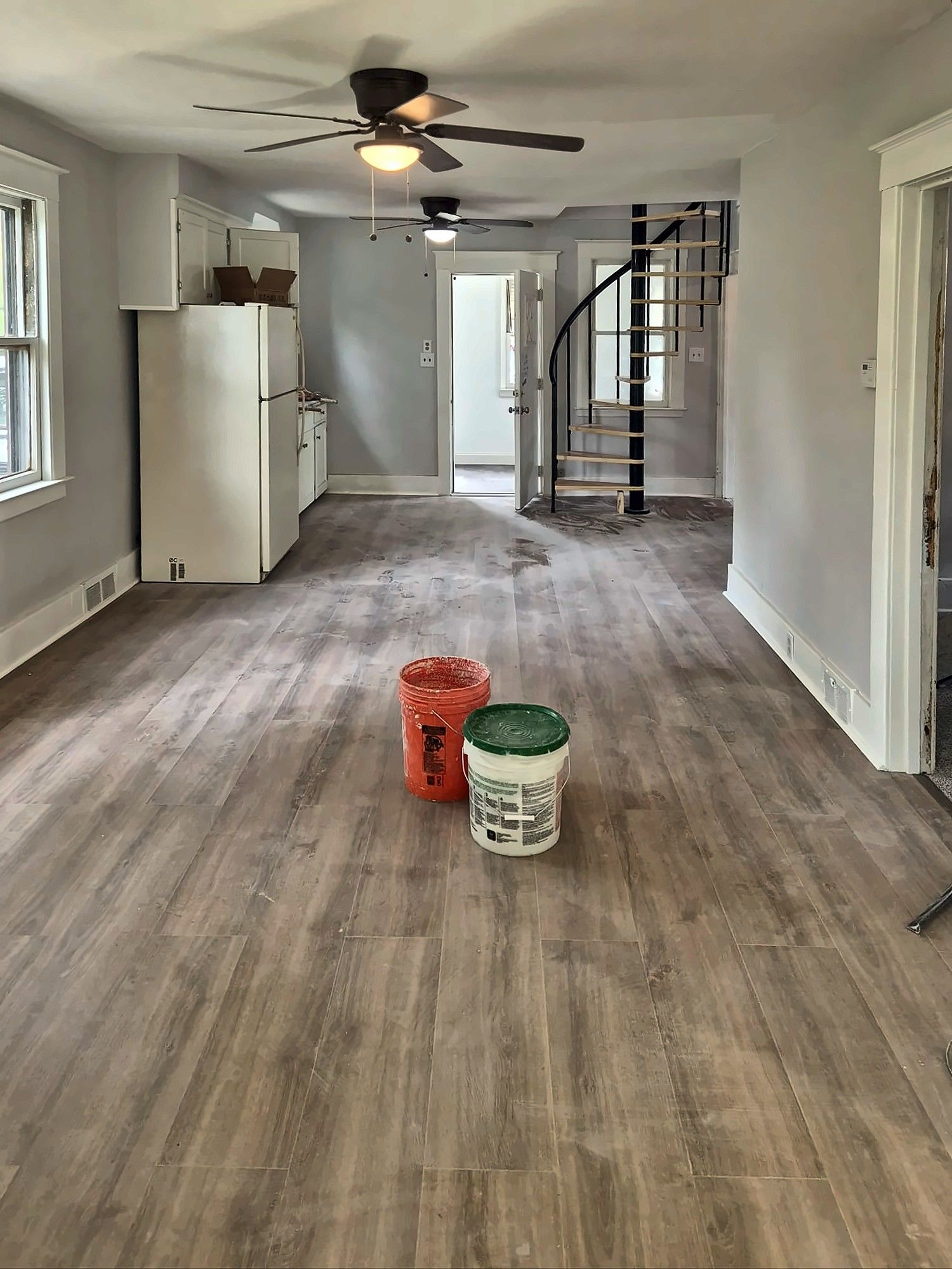 Renovated open floor plan with vinyl plank flooring