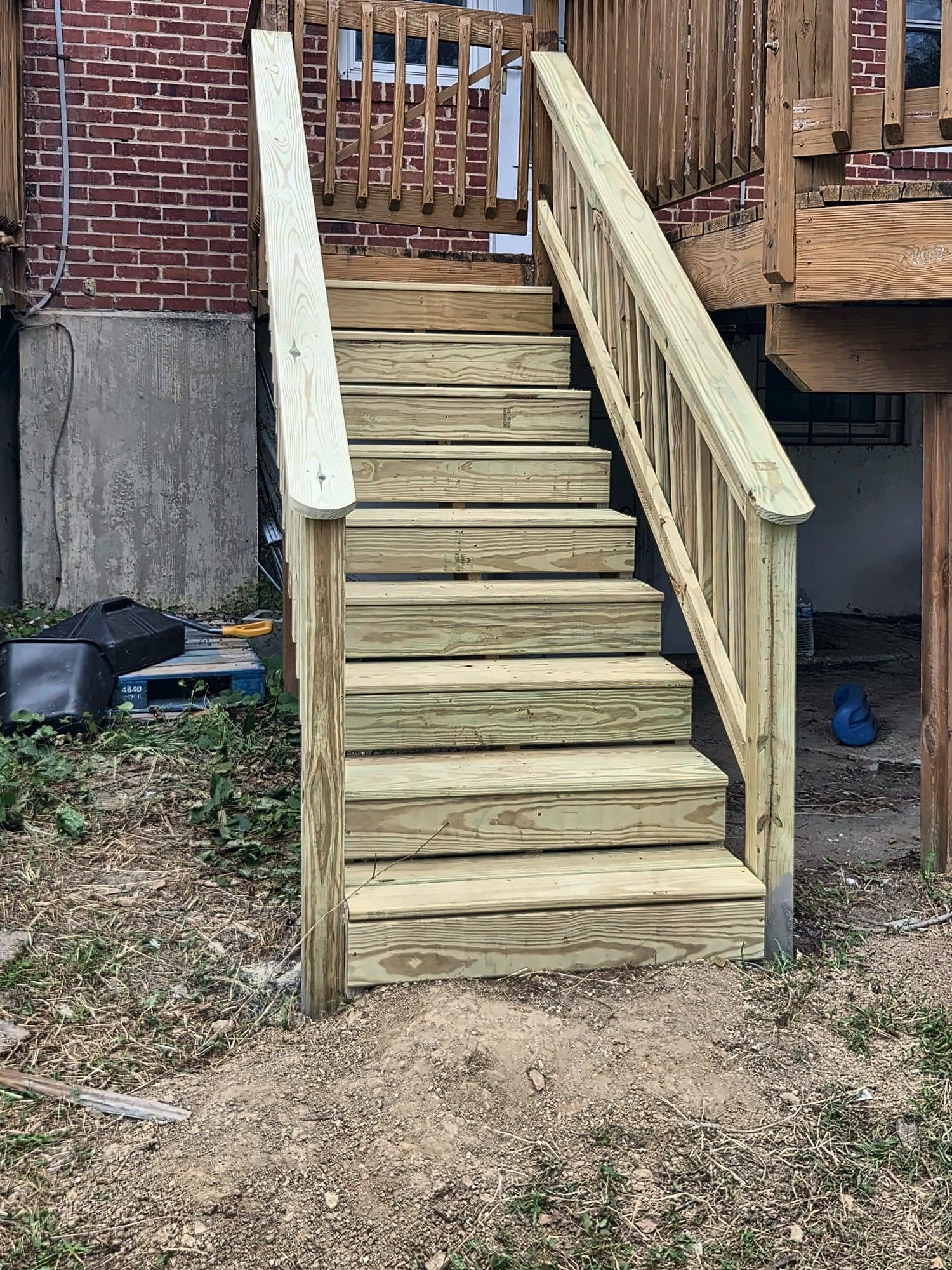 Angled view of new rear wood staircase