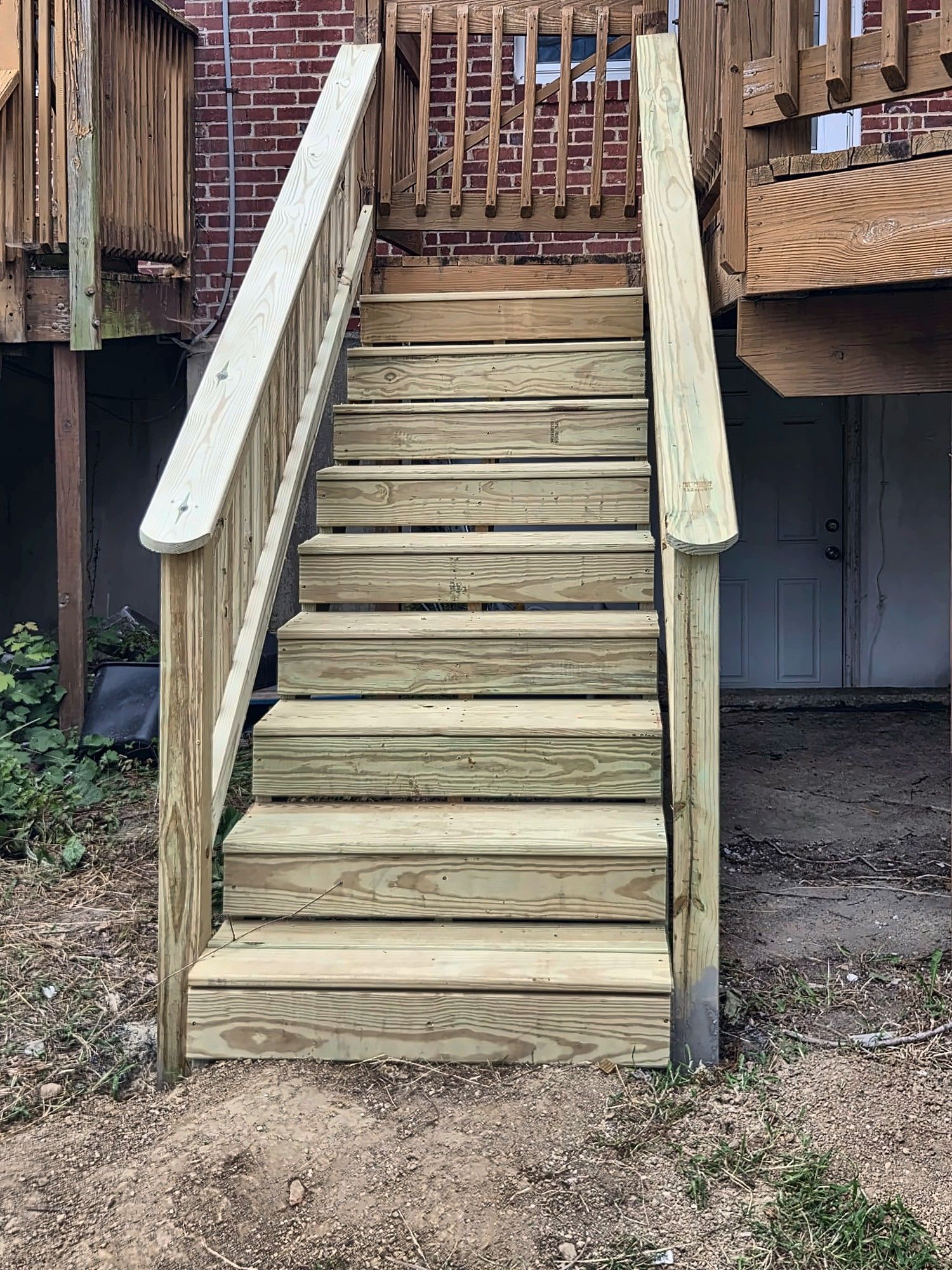Straight-on view of new rear wood staircase