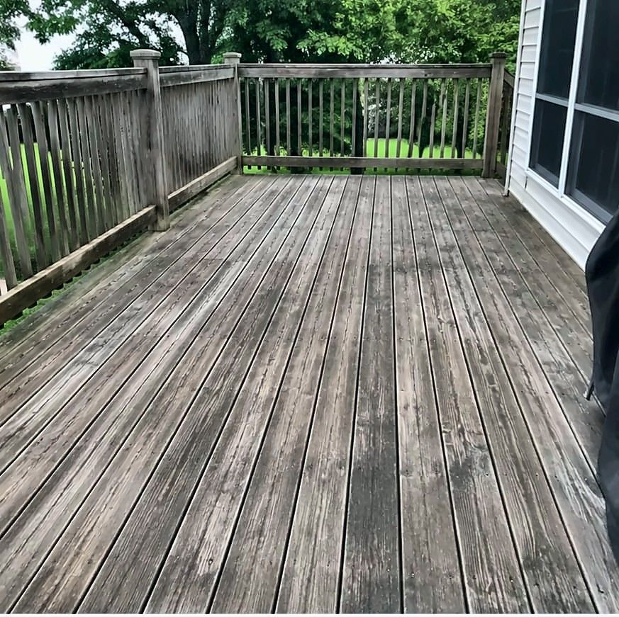 Weathered wood deck before refinishing